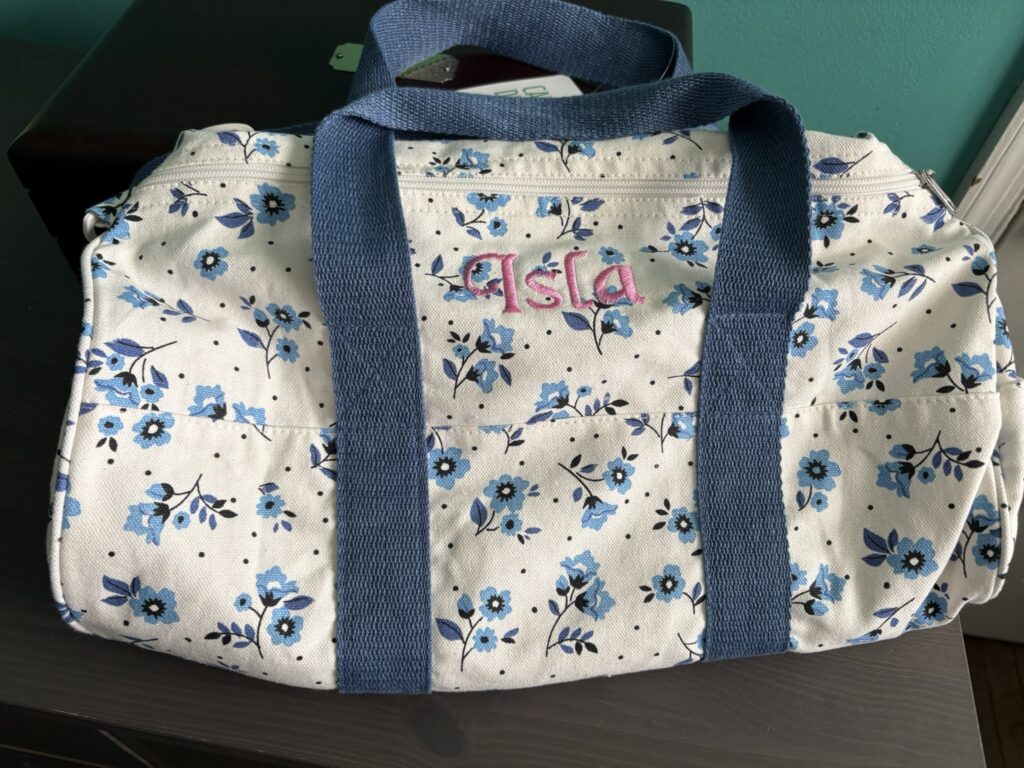 Personalized canvas tote bag with baby name machine embroidery